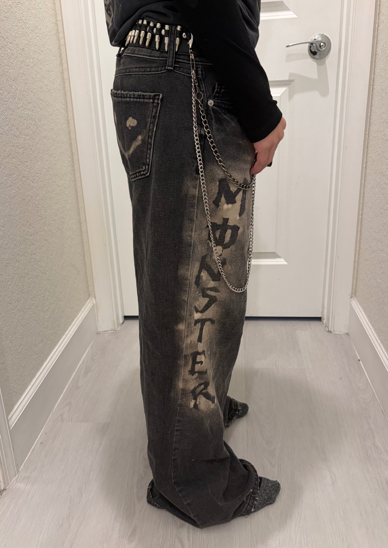 Custom finished MONSTER denim with belt and chain