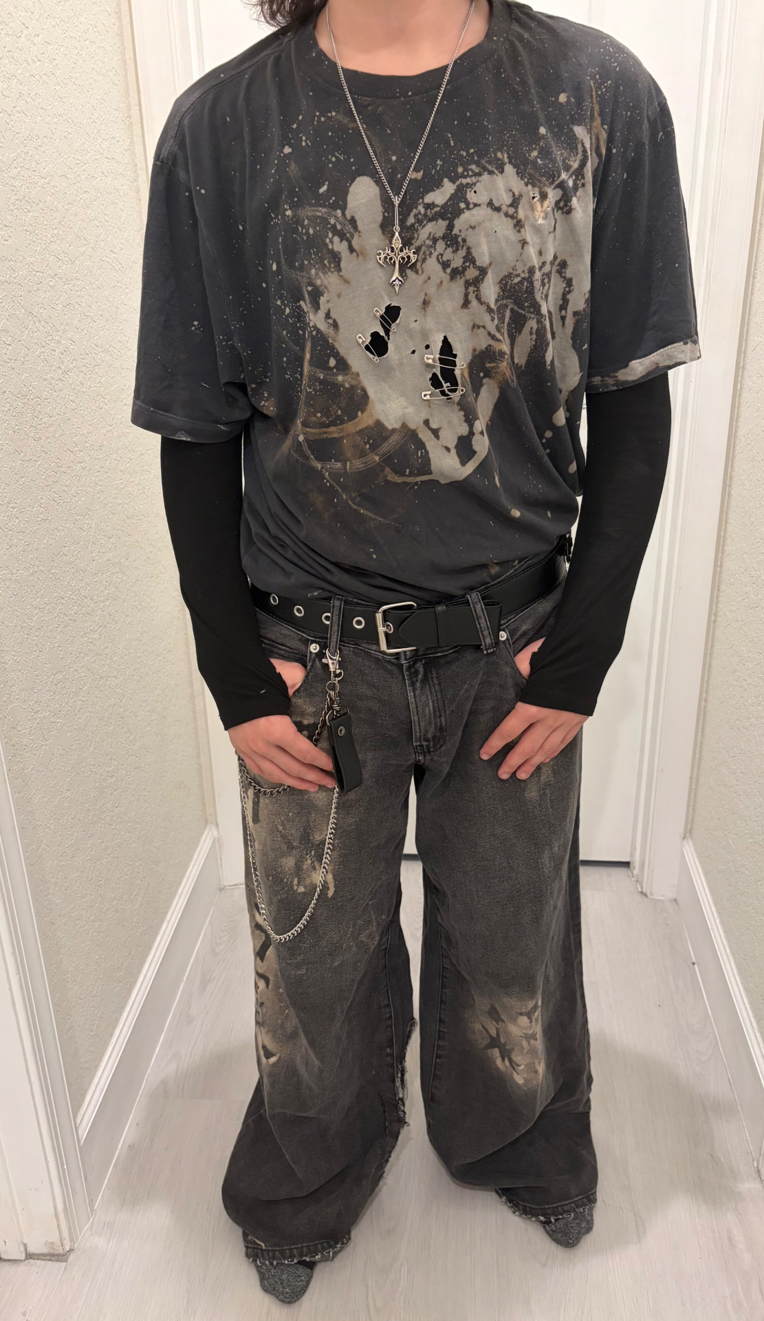 Bleached graphic tee with chain belt, front view